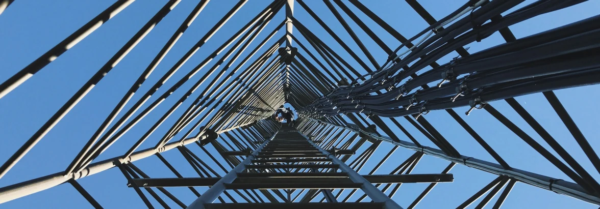 Multi-IMSI technology - view inside a connectivity tower against a blue sky