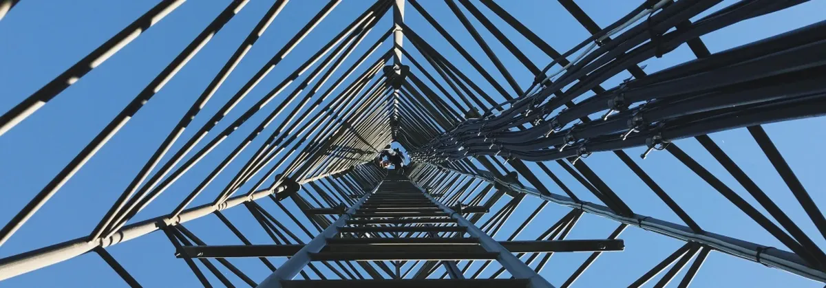 Multi-IMSI technology - view inside a connectivity tower against a blue sky