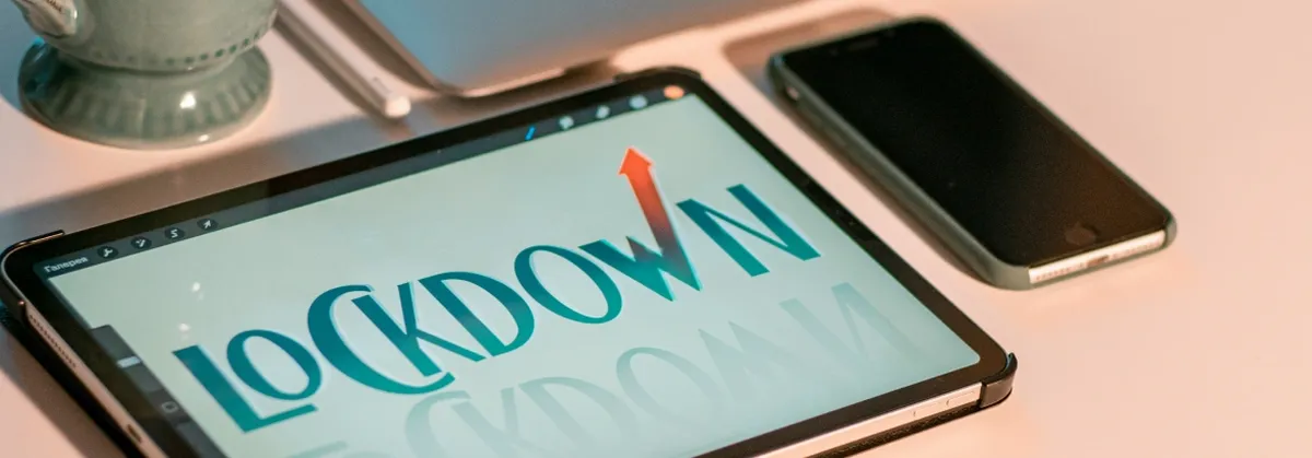A digital tablet showing the word LOCKDOWN