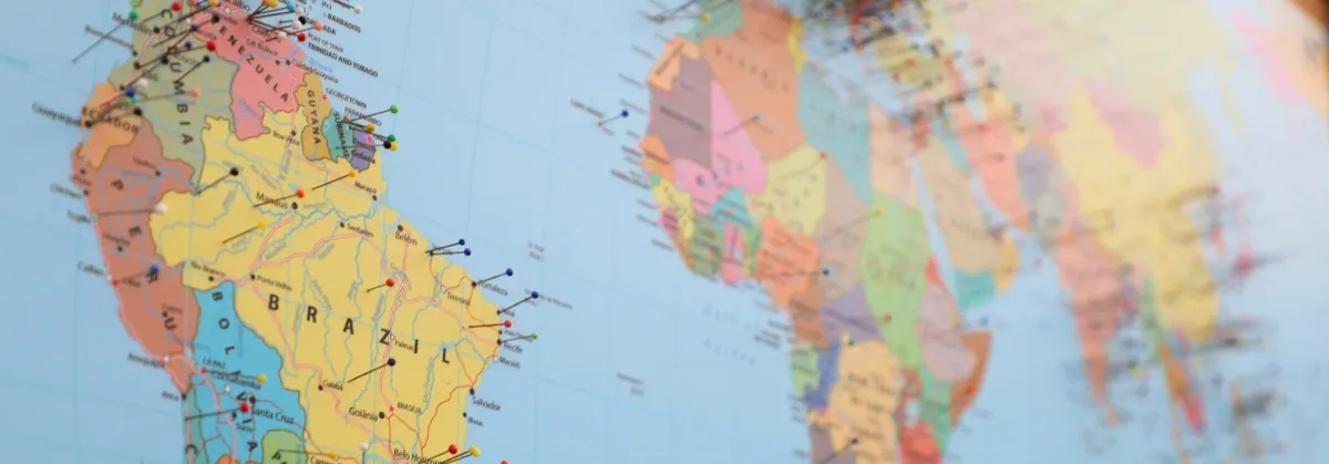 A World Map with Pins in Locations