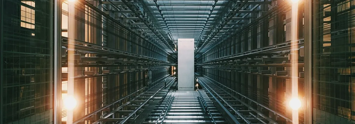A long corridor with a data server located in the middle