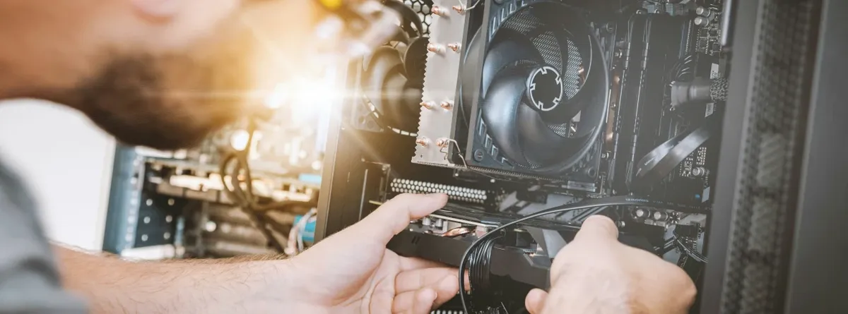 A technician assembles computer components