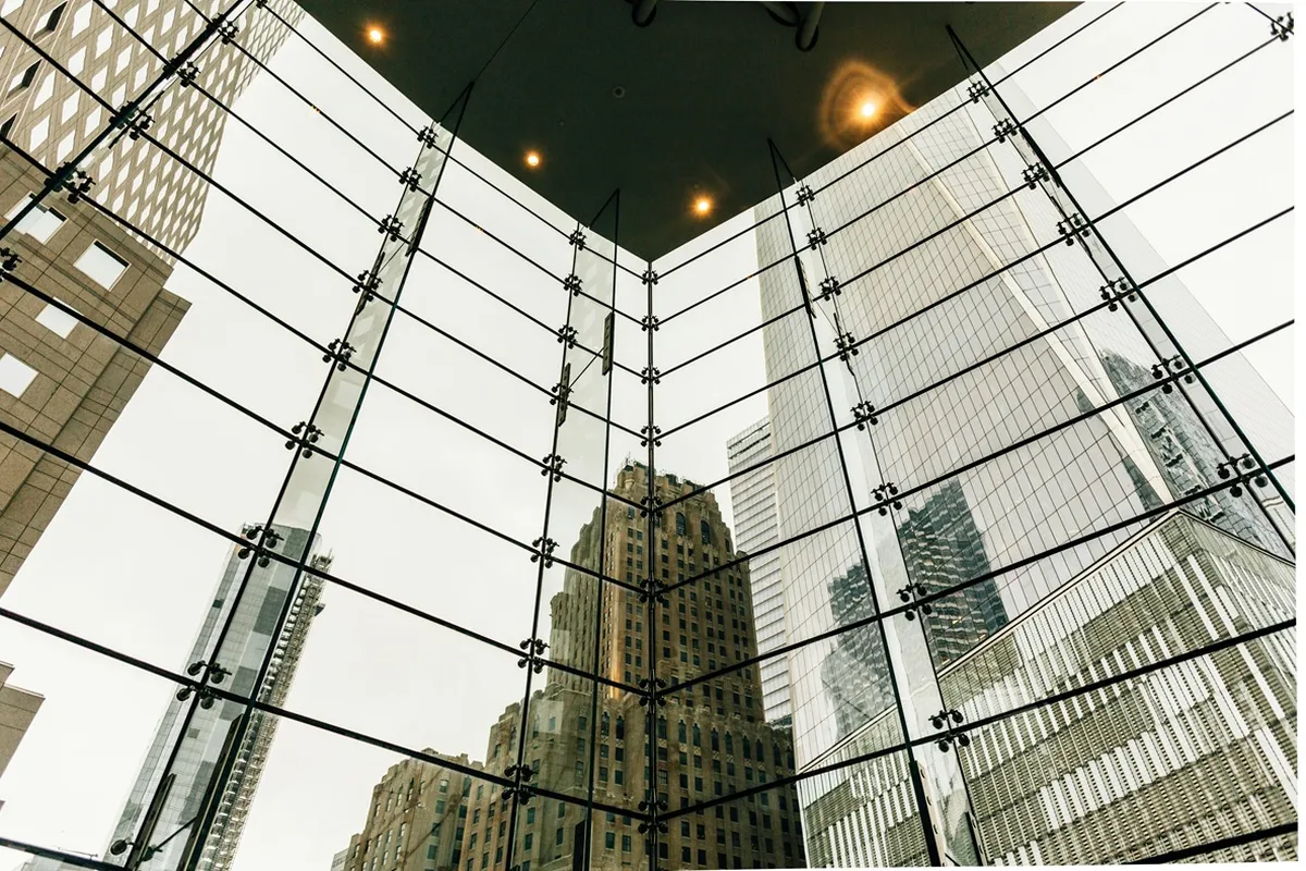 Skyscrapers reflected in a window mosaic