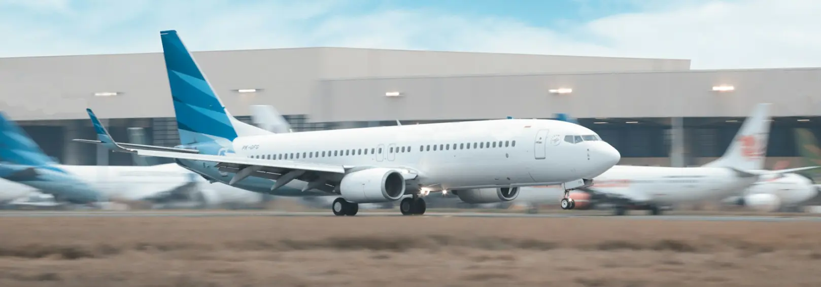 An airplane taking off, facilitated by standards imposed by the AEEC