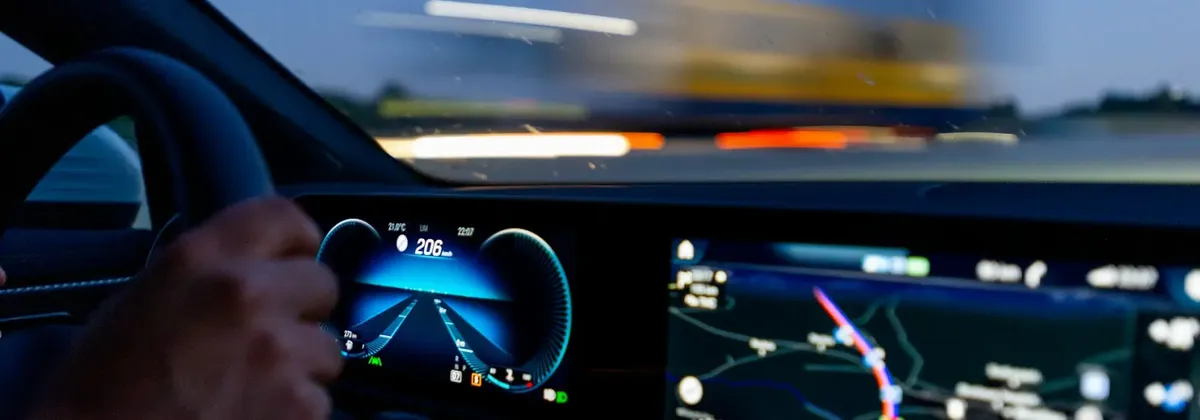 A view of a car dashboard at night