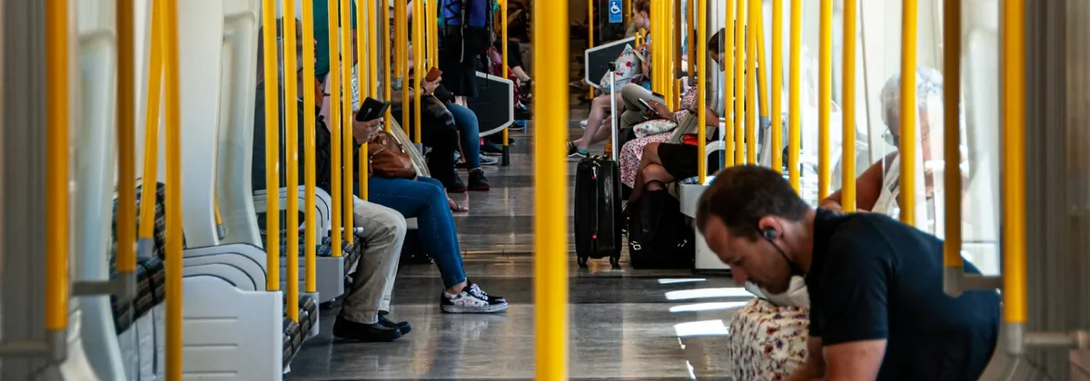 Digital brands scaling mobile - Passengers on a train using their phones