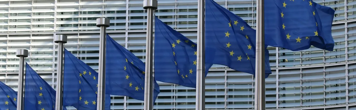 EU flags outside the European Commission, creators of MiFiD III