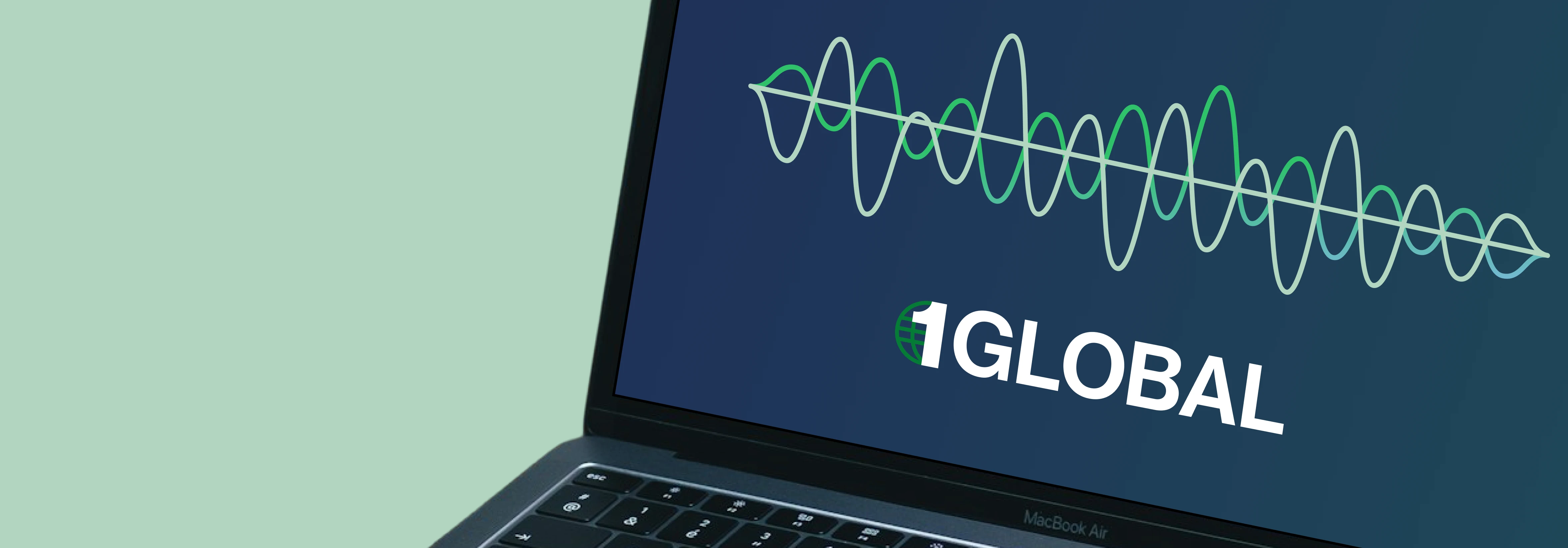 Communications Analytics - Laptop screen showing a transcription graphic and the 1GLOBAL logo