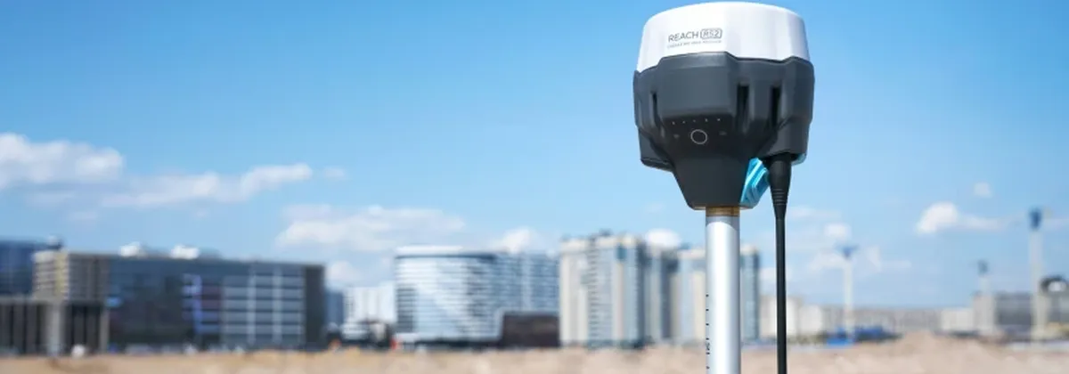 SGP.32 turning point for IoT - an IoT-connected camera against a cityscape backdrop and blue sky