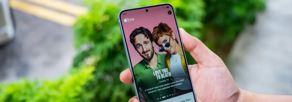 Telco's Netflix Moment - a hand holding a mobile phone displaying a TV show